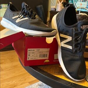 New Balance Black and White Sneakers with Cushioned Sole